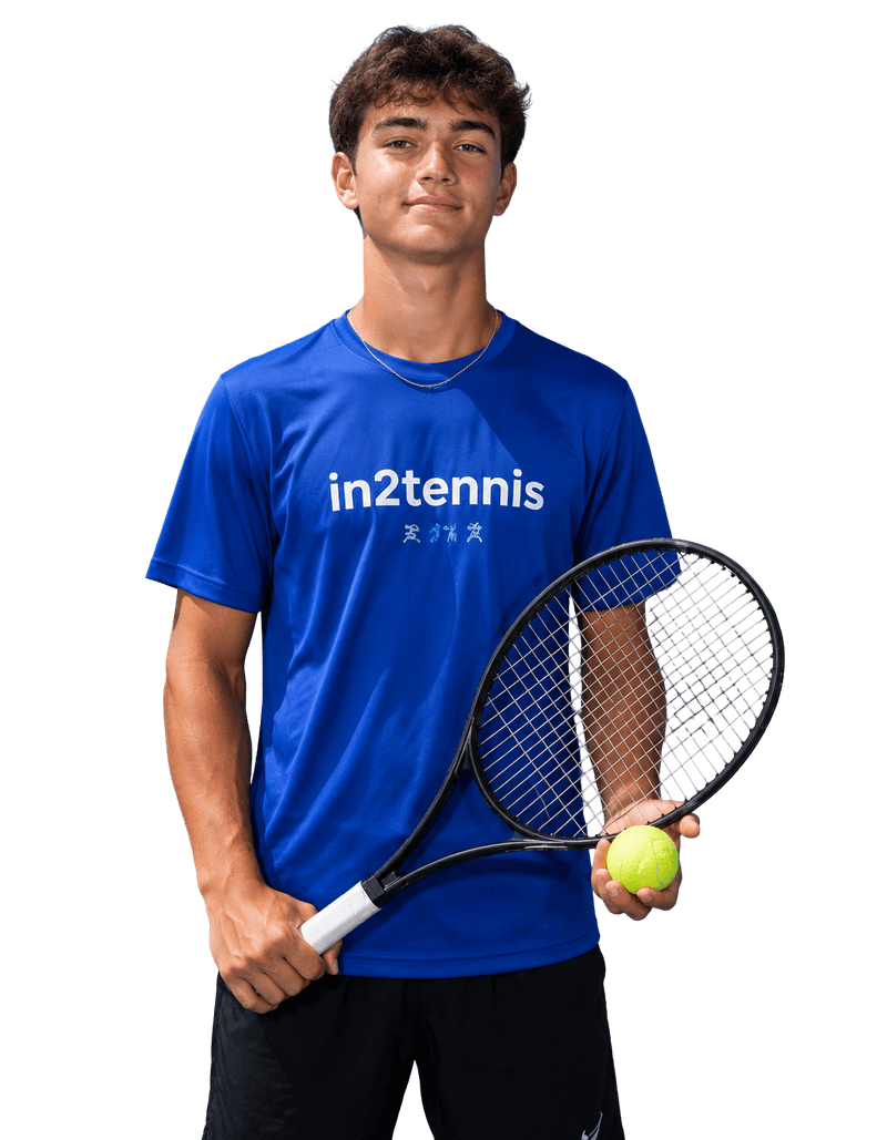 Junior in2tennis player holding a racquet